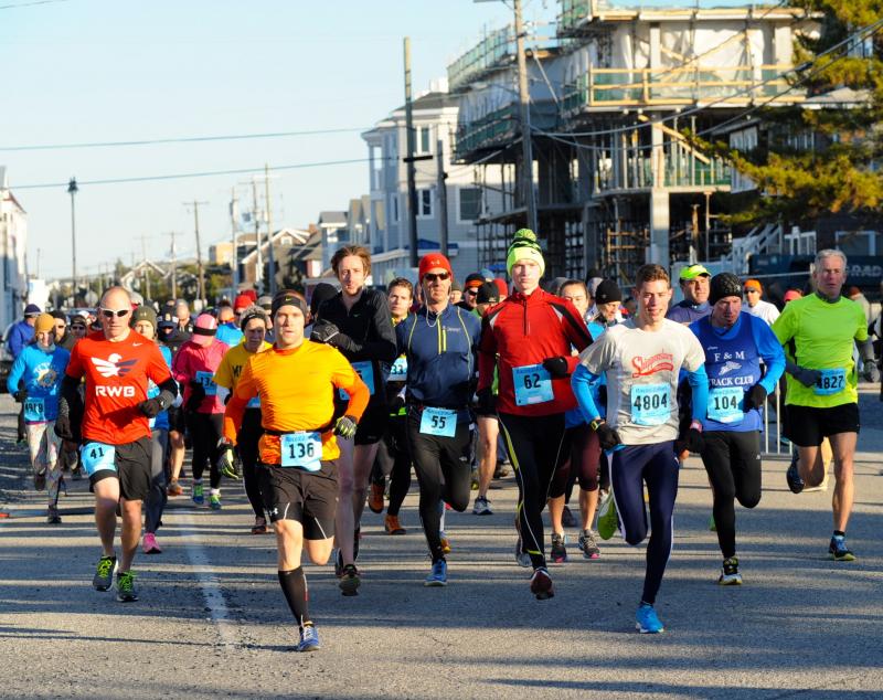 Some runners race the Hair of the Dog 10K at 8:45 a.m., then the 5K at 10 a.m. on New Year’s Day and then jump in the Atlantic Ocean with the Eskimos at noon in downtown Bethany Beach. DAVE FREDERICK PHOTO